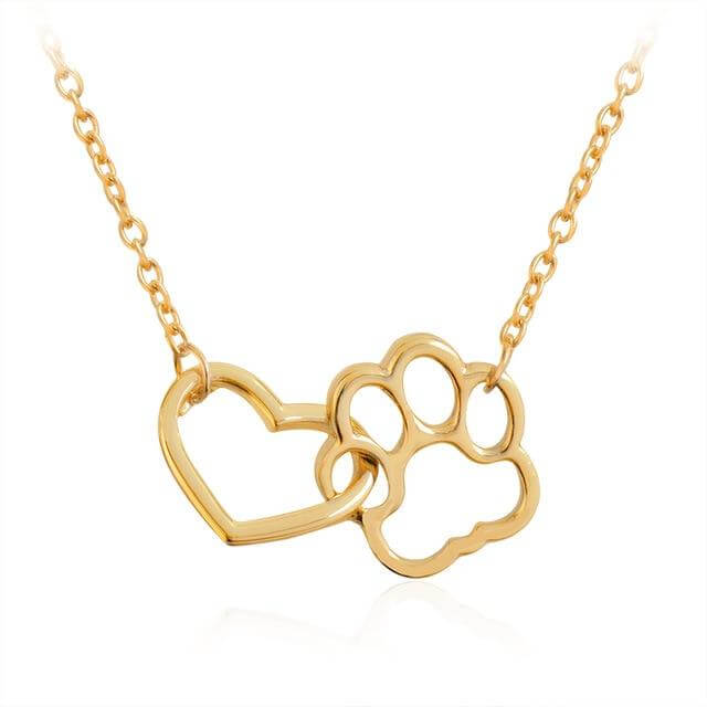 Women's silver paw print heart necklace. A sentimental animal lover's gift for dog moms & cat moms.