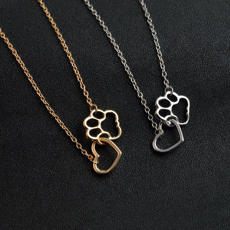 Sentimental women's paw print heart necklace, ideal gift for dog moms, cat moms, & pet enthusiasts.