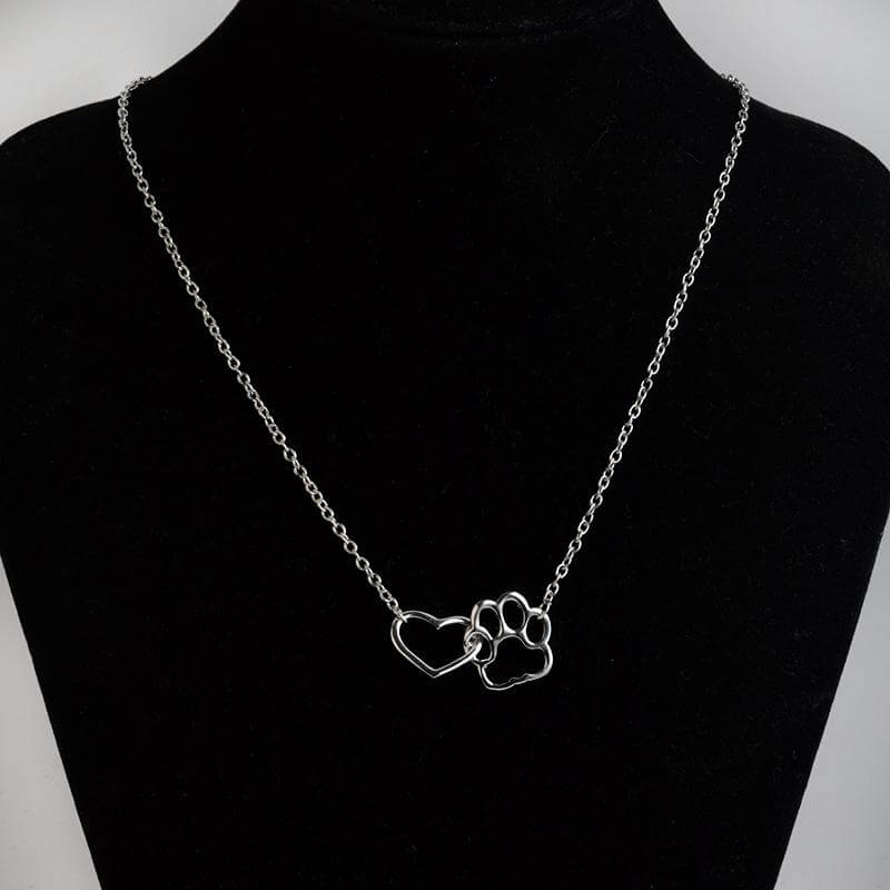 Gold paw print heart necklace on a fine chain, sentimental jewelry for dog moms & cat moms.