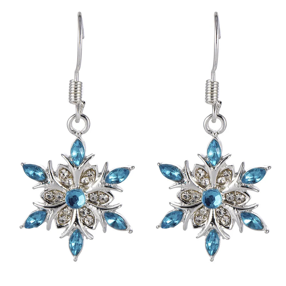 Women's silver snowflake dangle earrings, perfect festive Christmas holiday jewelry.