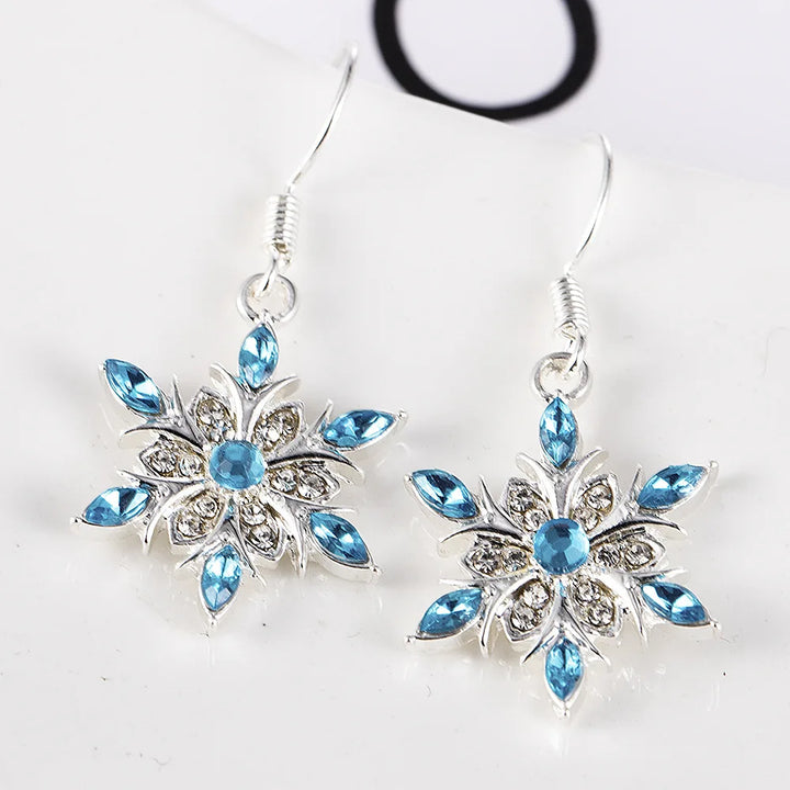 Elegant sterling silver snowflake earrings, a festive winter jewelry gift for women.