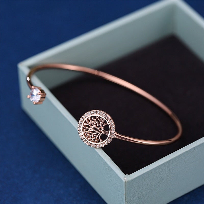 Close-up of an elegant adjustable Tree of Life metal bracelet for women, representing spiritual growth & connection.