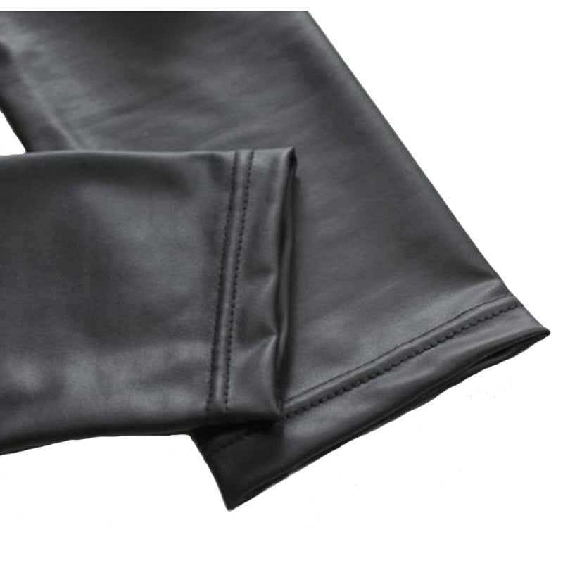 Black high-shine women's leggings, offering a sleek, modern, and comfortable slim fit. Edgy and chic.