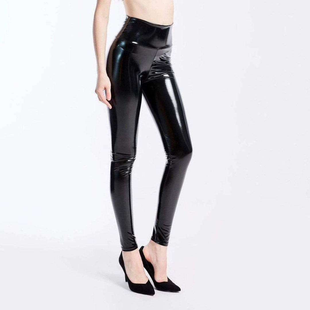 Women's sleek black PU leather sculpting leggings, high-waisted for a comfortable, stylish, slimming fit. Chic fashion.