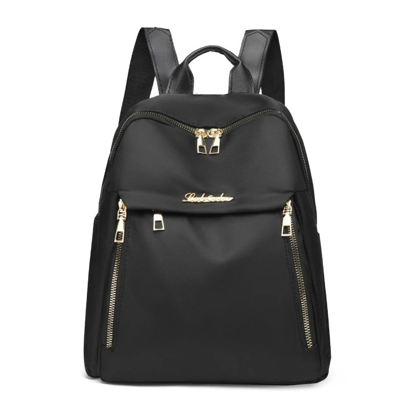 Women's sleek black PU leather travel backpack for daily essentials and fashion.