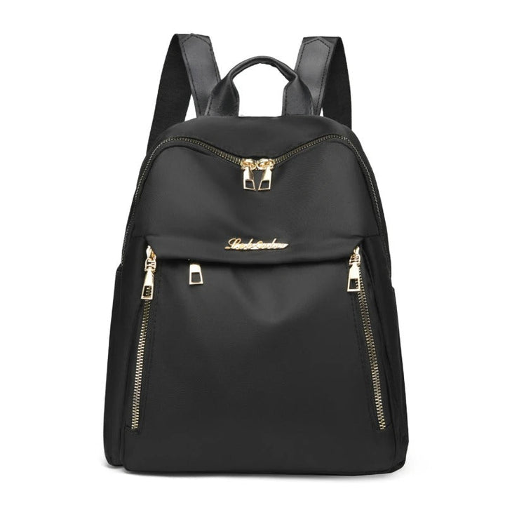 Women's sleek black PU leather travel backpack for daily essentials and fashion.