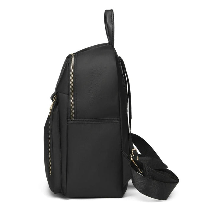 Elegant women's PU leather backpack, a perfect blend of style and utility for travel.