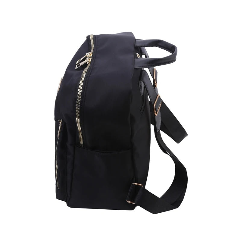 Fashionable black PU leather bag for women, doubling as a stylish travel backpack.