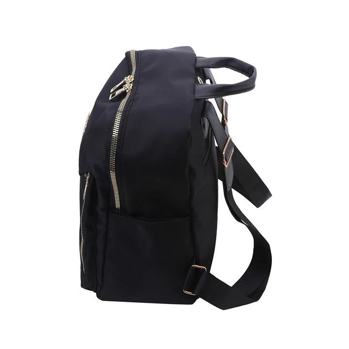 Fashionable black PU leather bag for women, doubling as a stylish travel backpack.