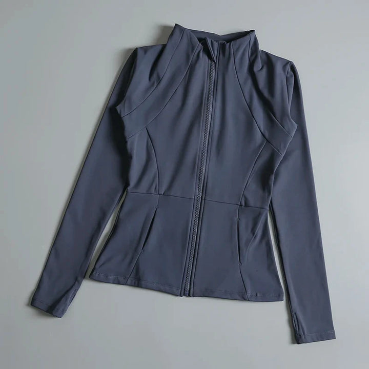 Supportive women's compression workout top with stand collar & long sleeves, ideal for yoga.