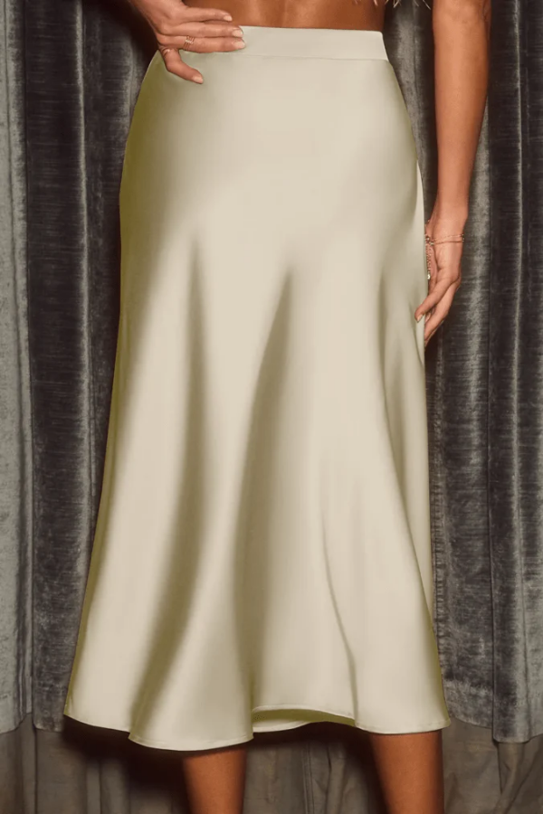 High-rise A-line midi skirt for women, sleek flowy fabric, perfect for elegant office, casual or formal wear.