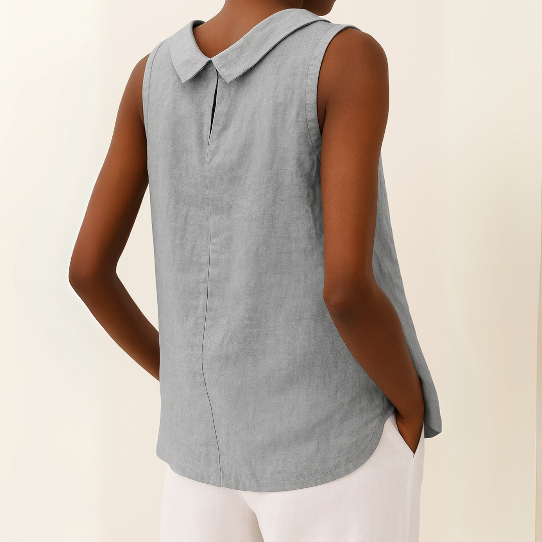 Relaxed fit sleeveless blouse for women, featuring a round neck, ideal for chic casual or office wear.