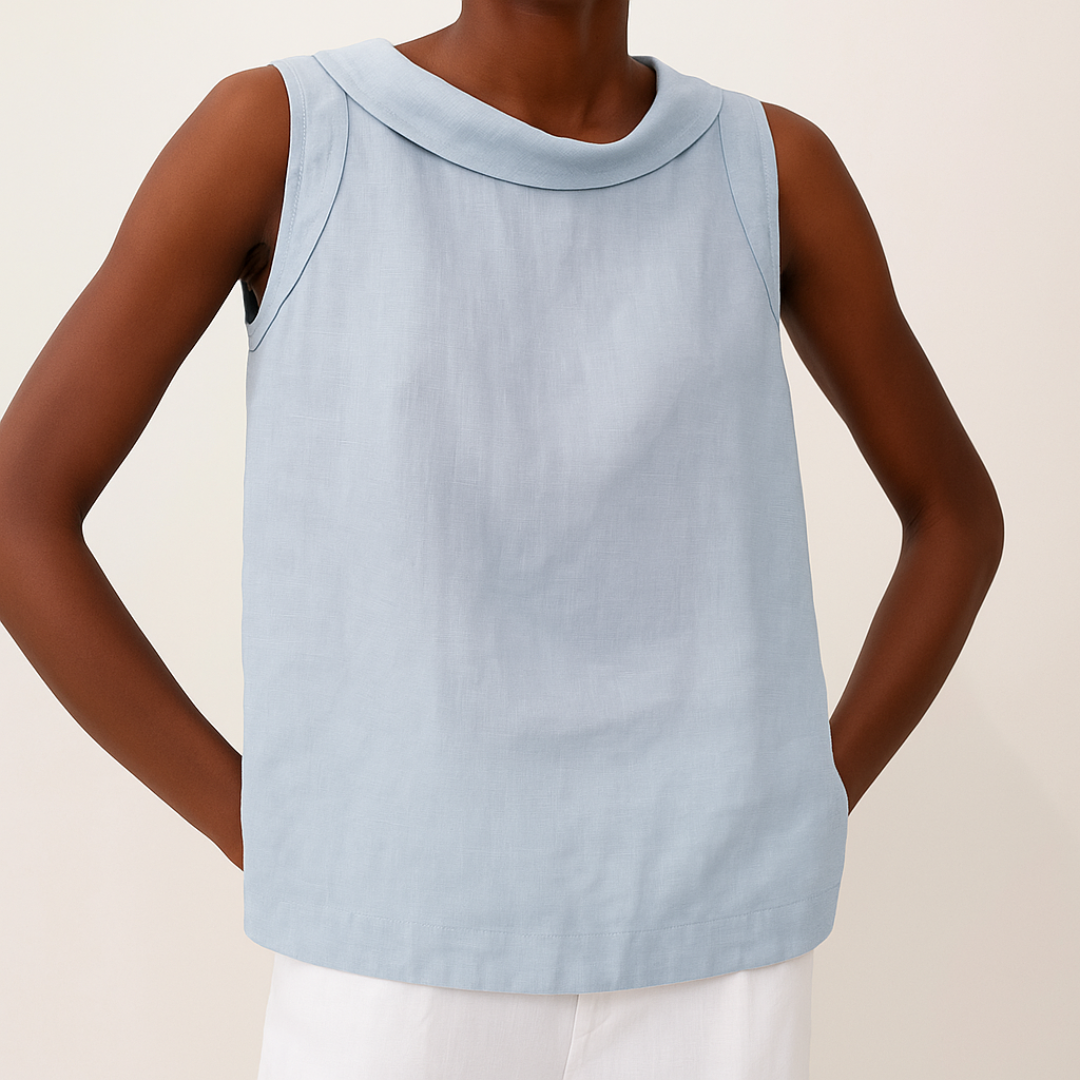Essential women's round neck sleeveless blouse, a comfortable basic top for everyday wear and layering.