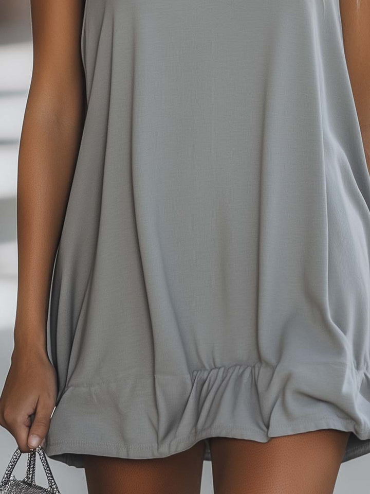 Versatile women's sleeveless hooded swing mini dress with ruffle hem, a must-have for summer comfort and style.