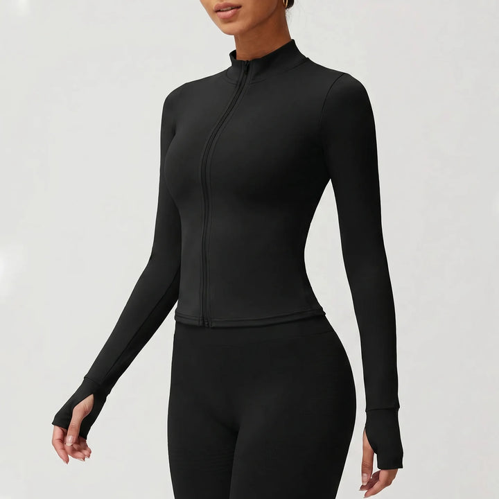 Slim-fit women's running jacket, zip-up athletic wear for dynamic workouts & outdoor activities.