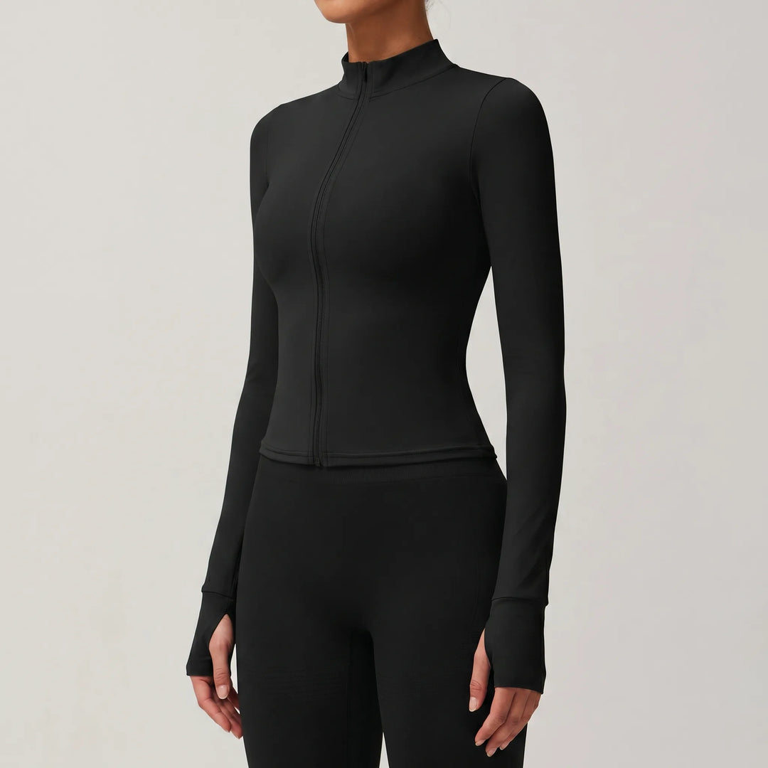 Women's activewear layering top, slim-fit sports jacket for diverse workouts & athletic performance.