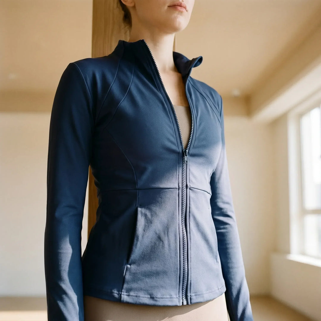 Women's slim-fit activewear jacket for enhanced running & gym performance.