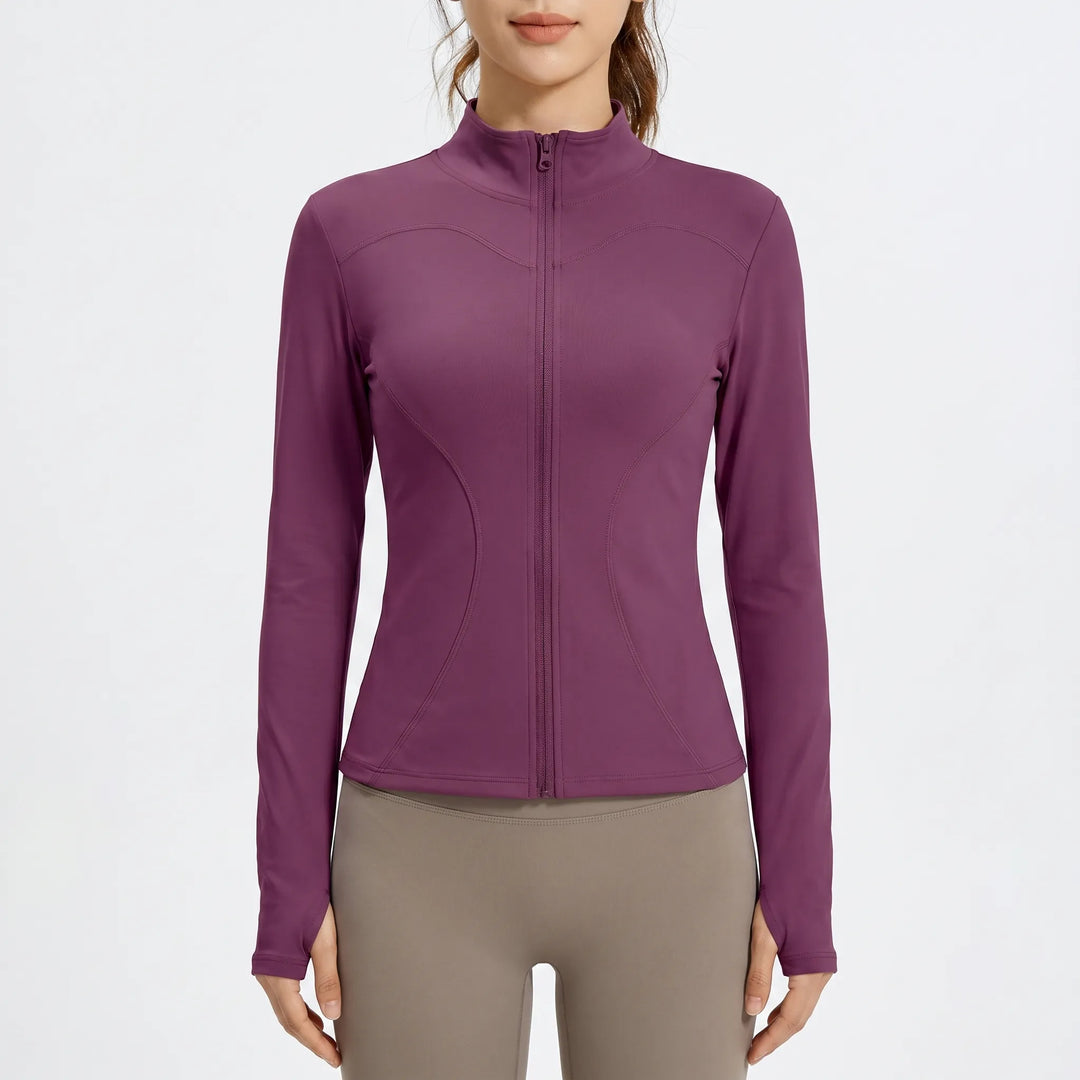 Versatile women's activewear jacket, slim-fit outer layer for dynamic workouts, running, and gym sessions.