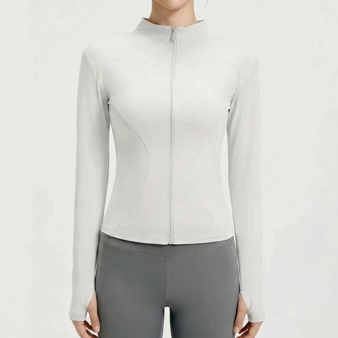 Sleek women's slim-fit workout jacket, high-performance athletic top designed for yoga and gym activities.