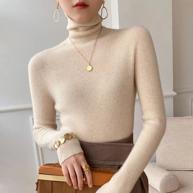 Women's slim fit turtleneck sweater, perfect for layering in elegant winter fashion.
