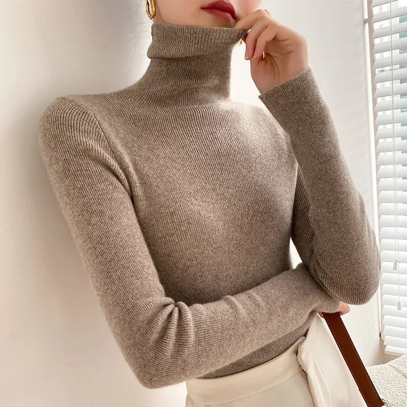 Classic women's slim fit turtleneck, an essential long sleeve sweater for elegant layering.