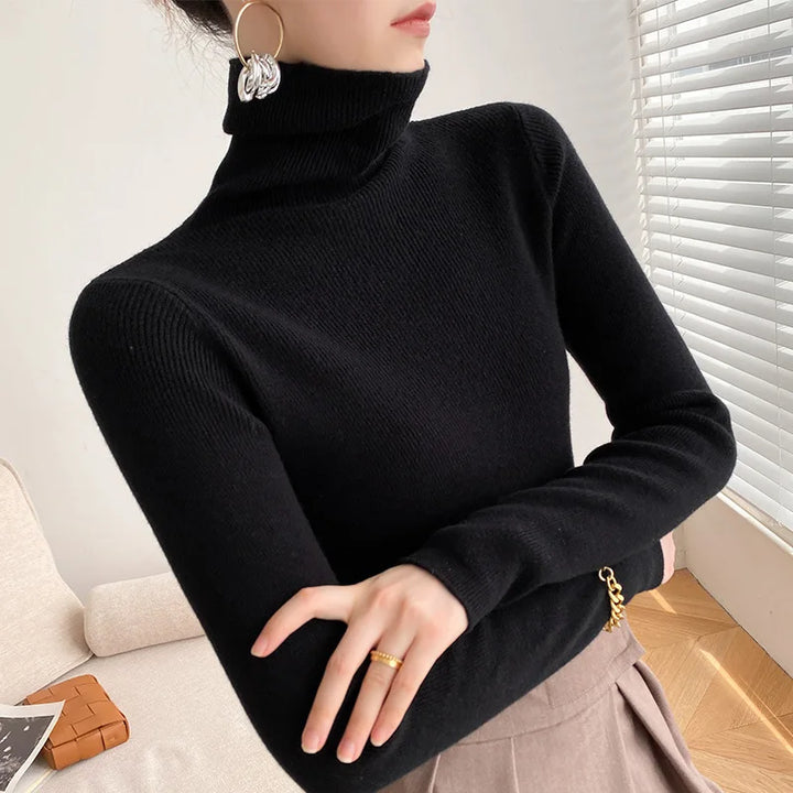 Women's long sleeve slim fit turtleneck sweater, versatile for casual wear & elegant winter layering.