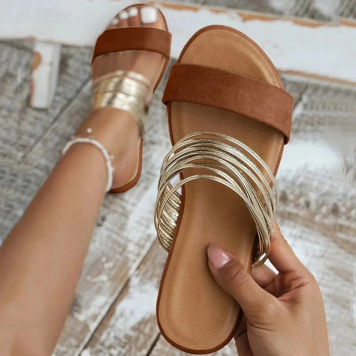 Lightweight open-toe slip-on women's sandals, great for everyday summer style.