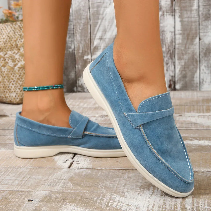 Smooth women's slip-on loafers with cushioned sole for versatile office and casual use.