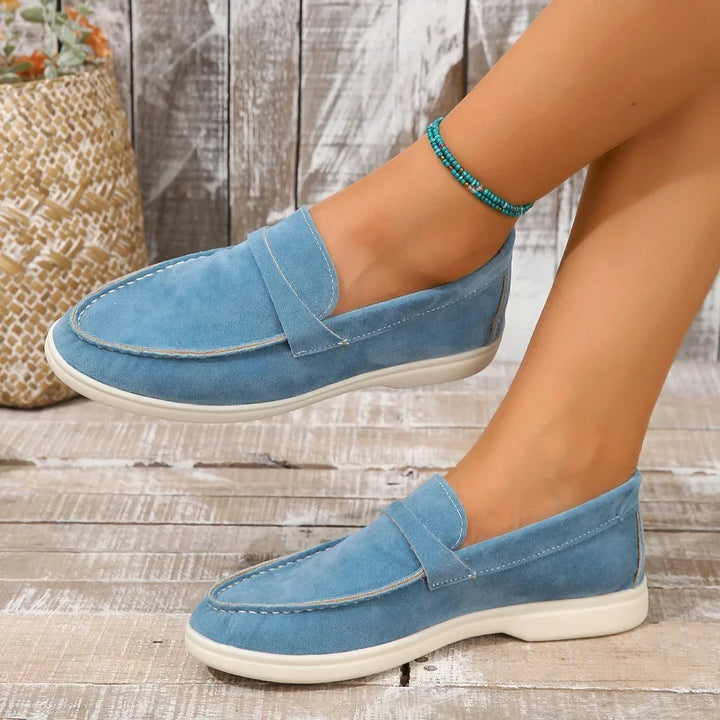 Women's classic slip-on loafers, cushioned for office and casual comfort.