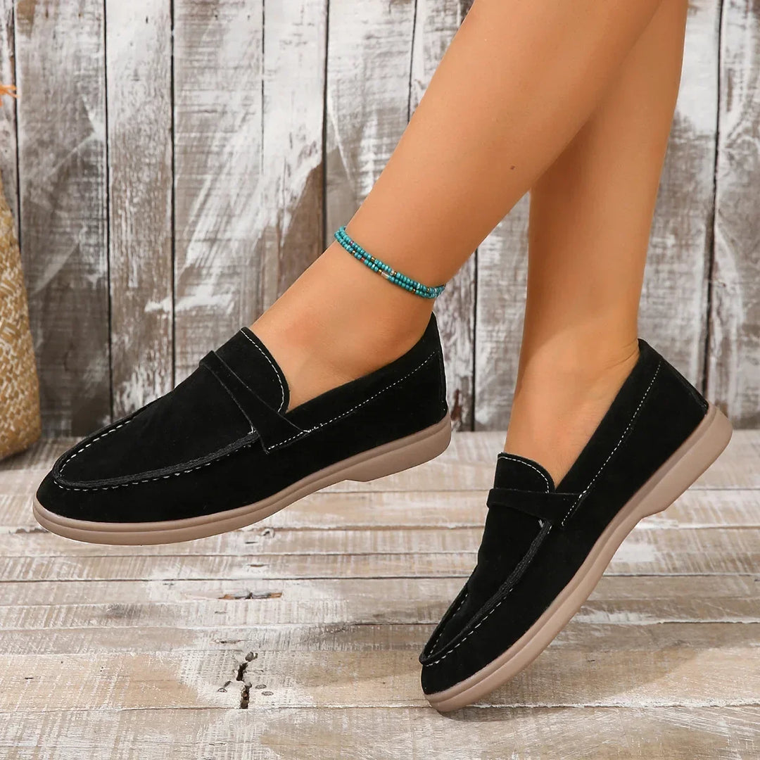 Professional women's slip-on loafers, cushioned for comfort in office or casual settings.