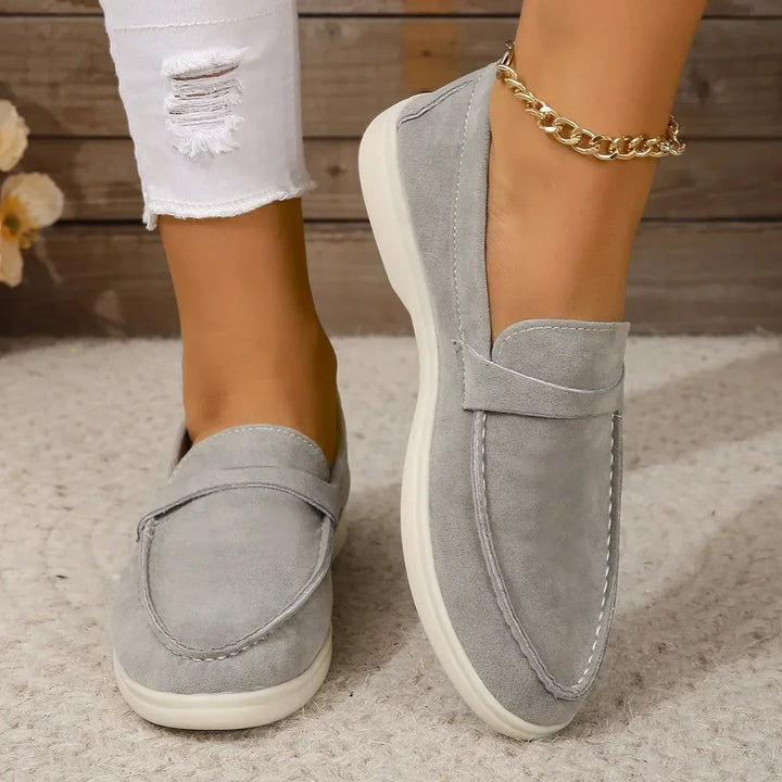 Classic women's slip-on loafers, elegant design for versatile office to casual wear.