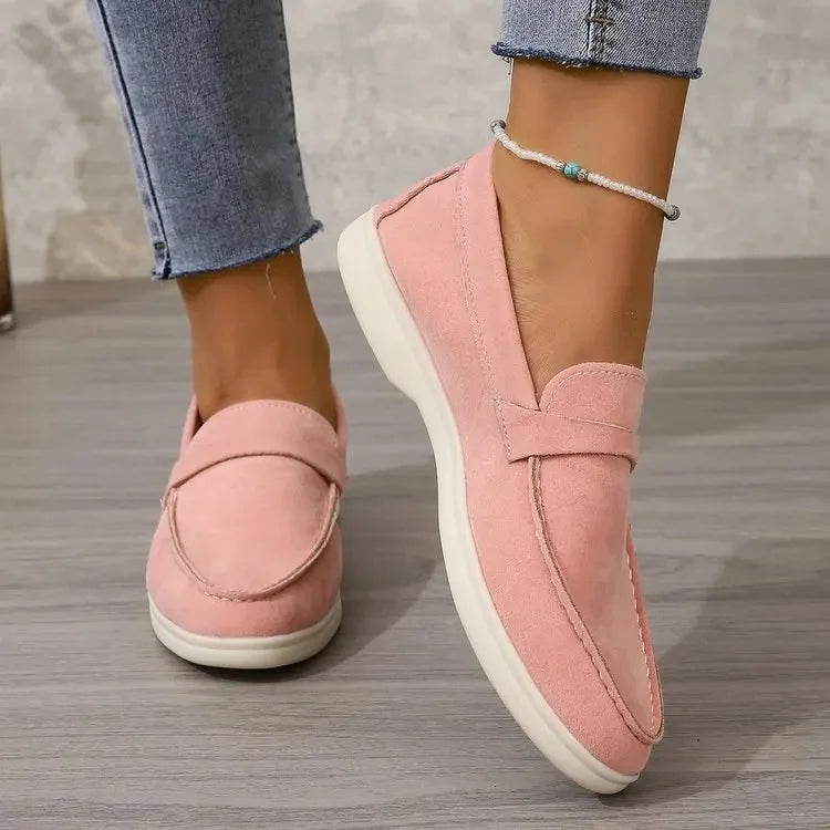 Elegant women's slip-on loafers, cushioned for comfort in office or casual settings.