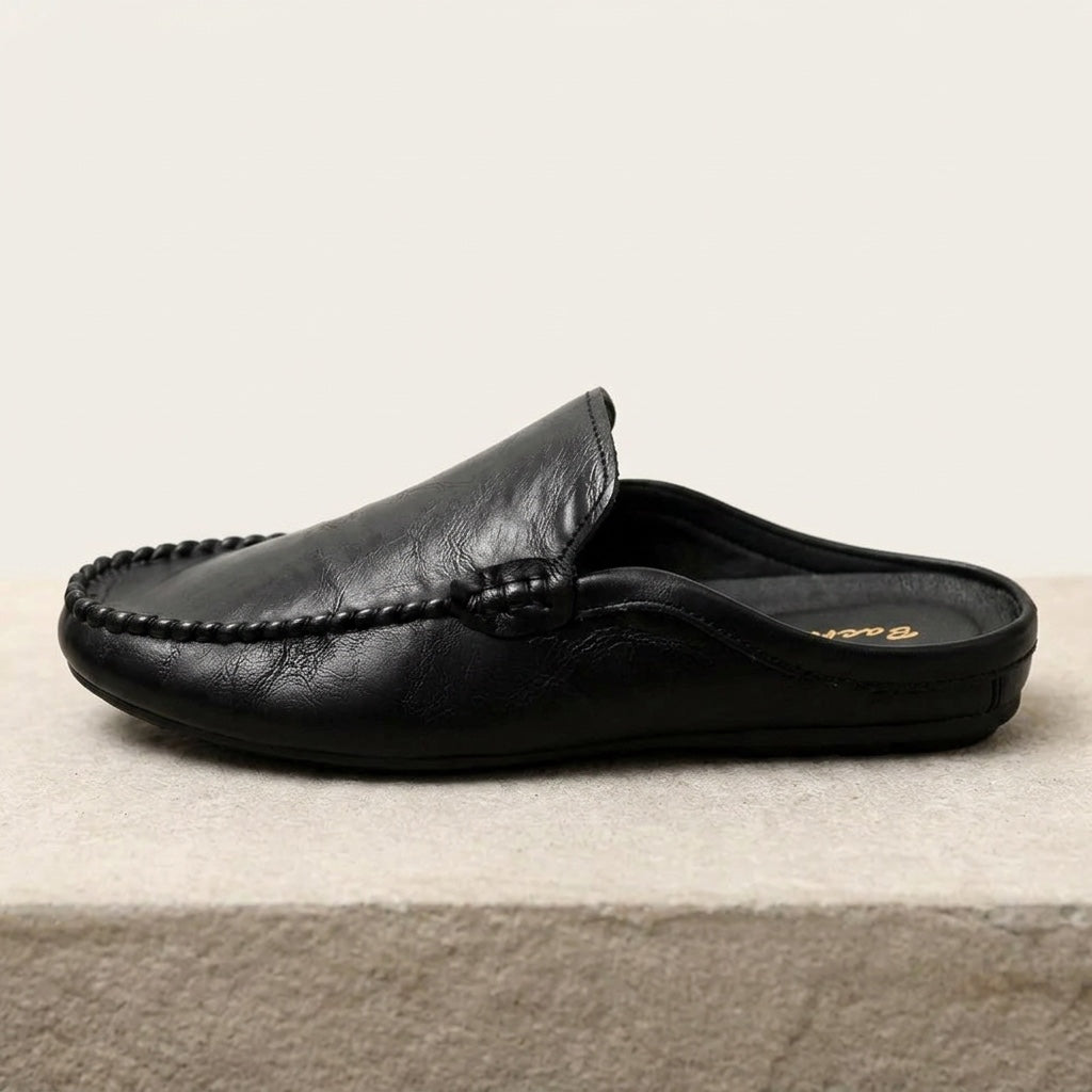 Summer fashion women's slip-on mules, comfortable & elegant. Hand-stitched flat shoes with a stylish open-back.