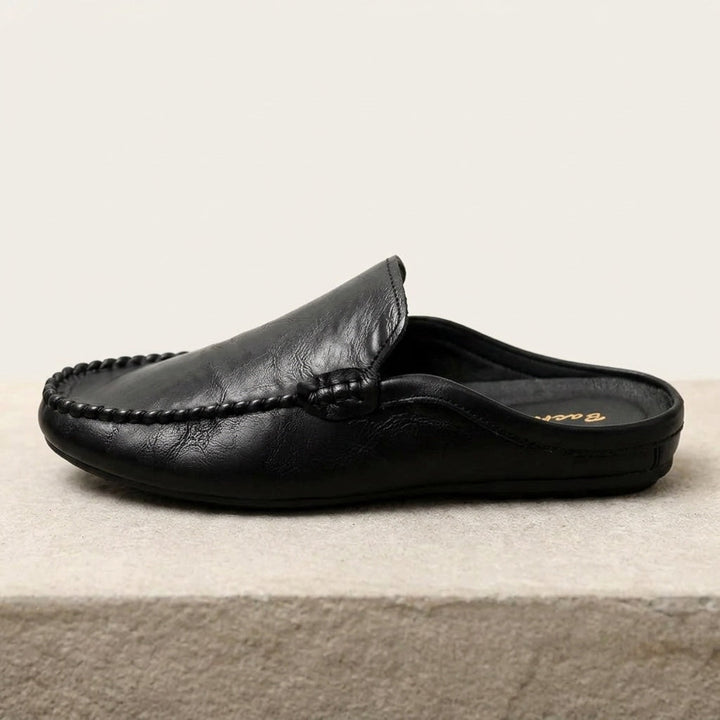 Summer fashion women's slip-on mules, comfortable & elegant. Hand-stitched flat shoes with a stylish open-back.