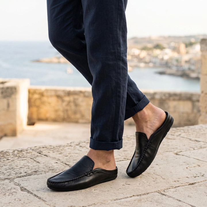 Elegant women's slip-on mules, hand-stitched for comfort & style. Flat casual shoes, perfect for warm weather.