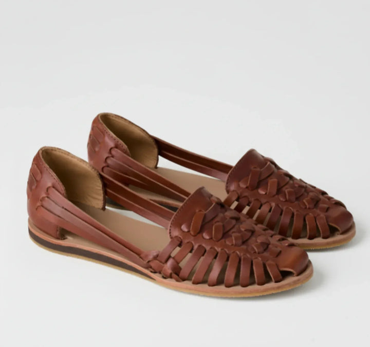 Chic women's slip-on mules with textured design, offering orthopedic support & easy open-back wear.