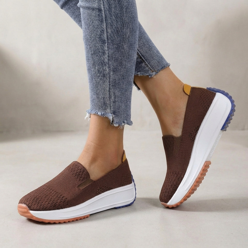 Women's orthopedic slip-on platform sneakers providing arch support & comfort for walking & active wear.