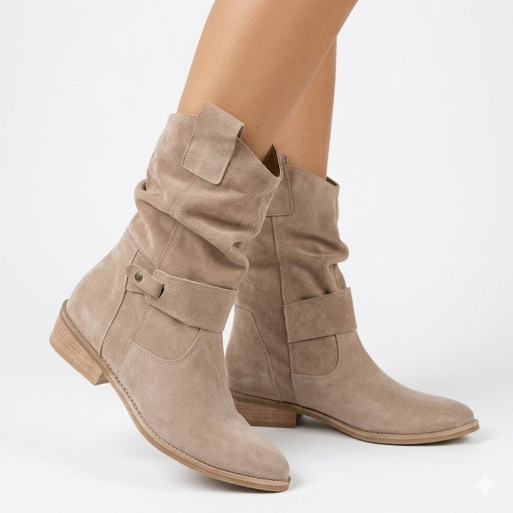 Women's slouchy ankle boots with low heel & stylish buckle strap for comfortable everyday autumn fashion.