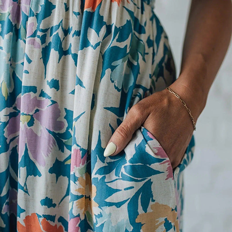 Smocked floral maxi dress for women, comfortable and chic for summer outings & vacations.