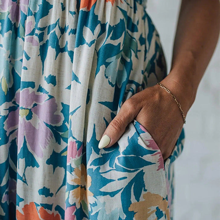 Smocked floral maxi dress for women, comfortable and chic for summer outings & vacations.