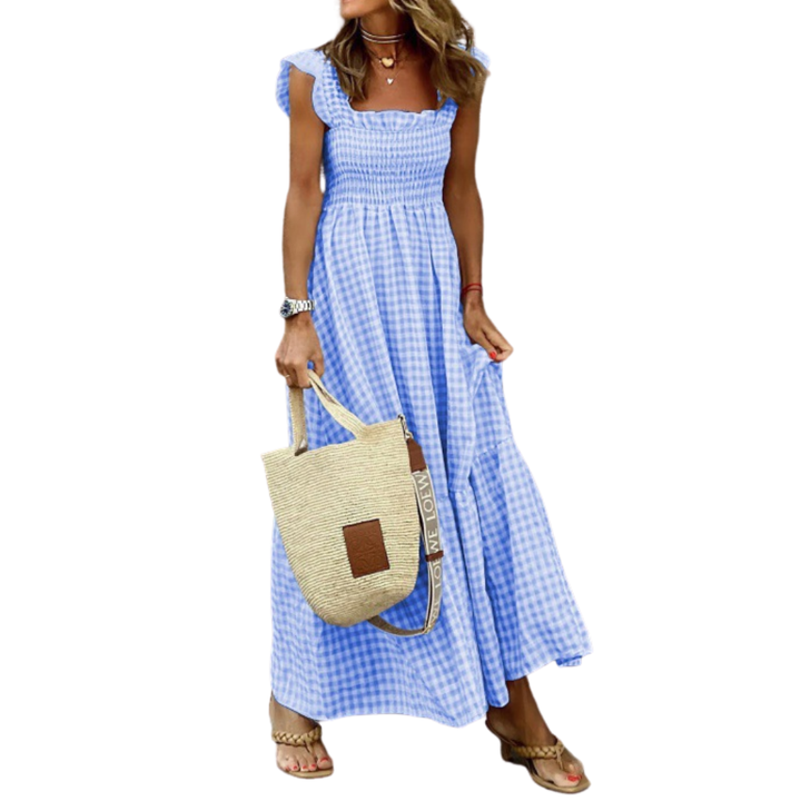 Casual long smocked tiered maxi dress for women. Effortless flowy style, ideal for summer and spring fashion.