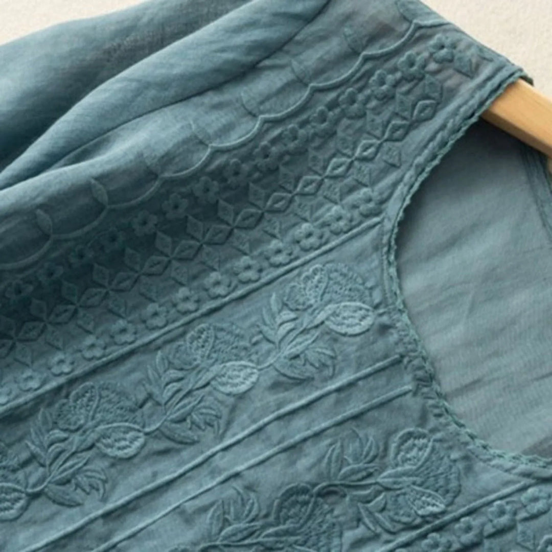Lightweight, soft feel women's blouse. Breathable summer top for versatile everyday fashion.