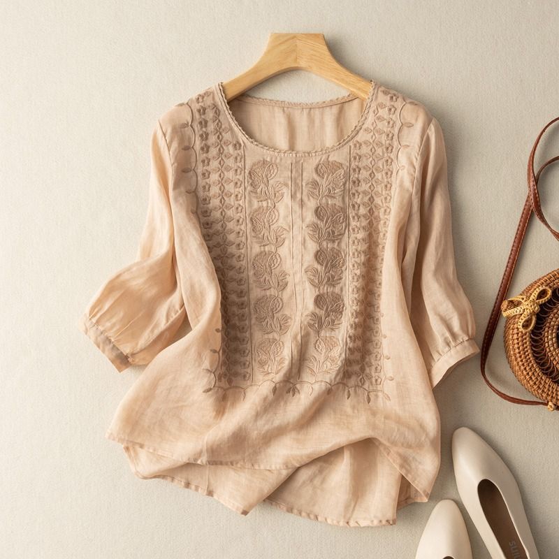 Enjoy comfort in this soft, breathable women's blouse. A versatile, loose-fit summer top for daily wear.
