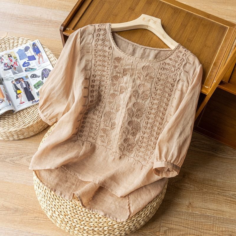 Lightweight, soft, and breathable women's blouse. Perfect everyday summer top with a comfortable loose fit.