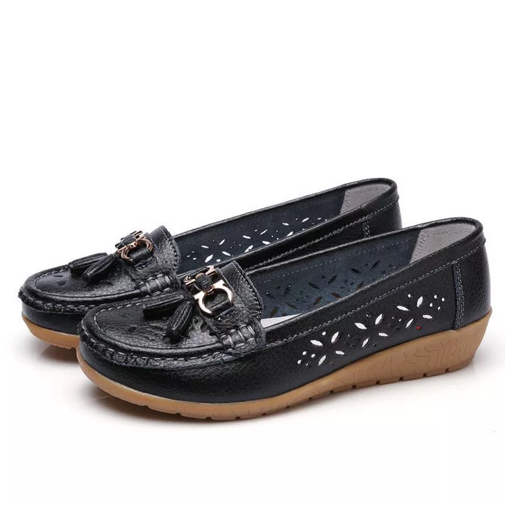 Casual women's summer moccasin sandals, offering breathable comfort and easy slip-on style.