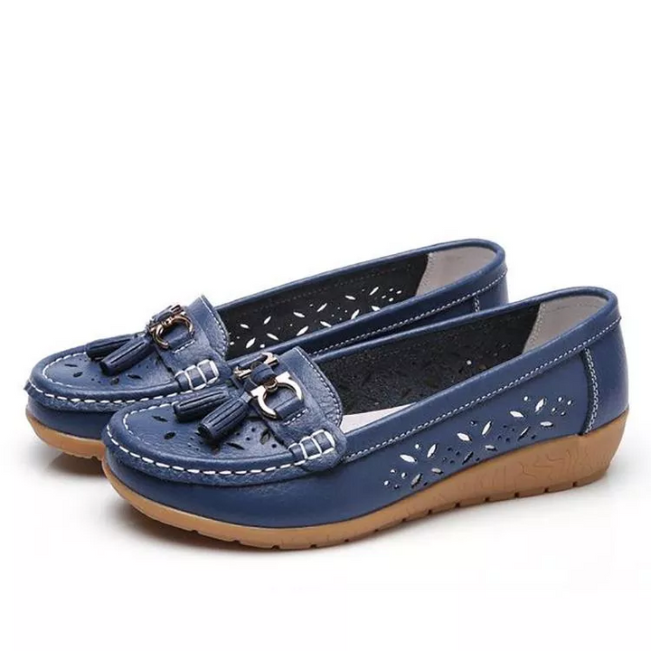 Soft women's moccasin sandals for everyday wear; breathable design & arch support for comfort.