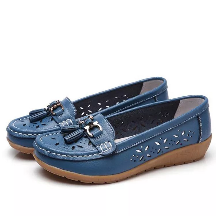 Breathable women's slip-on moccasin sandals, comfortable summer footwear with arch support.