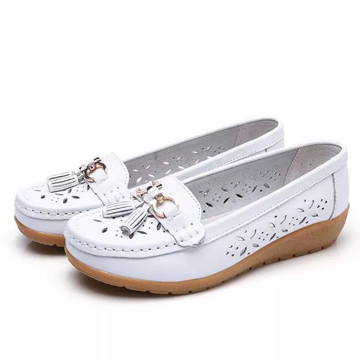 Comfortable women's moccasin sandals, soft & breathable for casual summer outings.