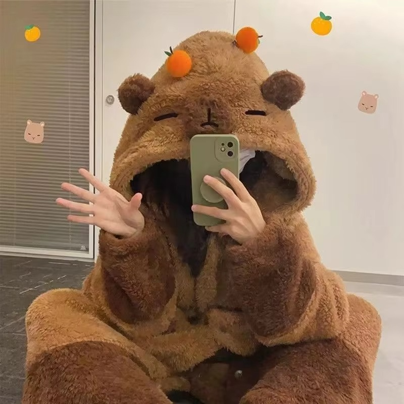 Close-up of the women's capybara hooded pajama set, showcasing cute animal ears & soft fabric. Kawaii sleepwear.