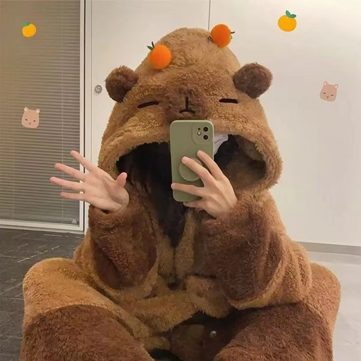 Close-up of the women's capybara hooded pajama set, showcasing cute animal ears & soft fabric. Kawaii sleepwear.
